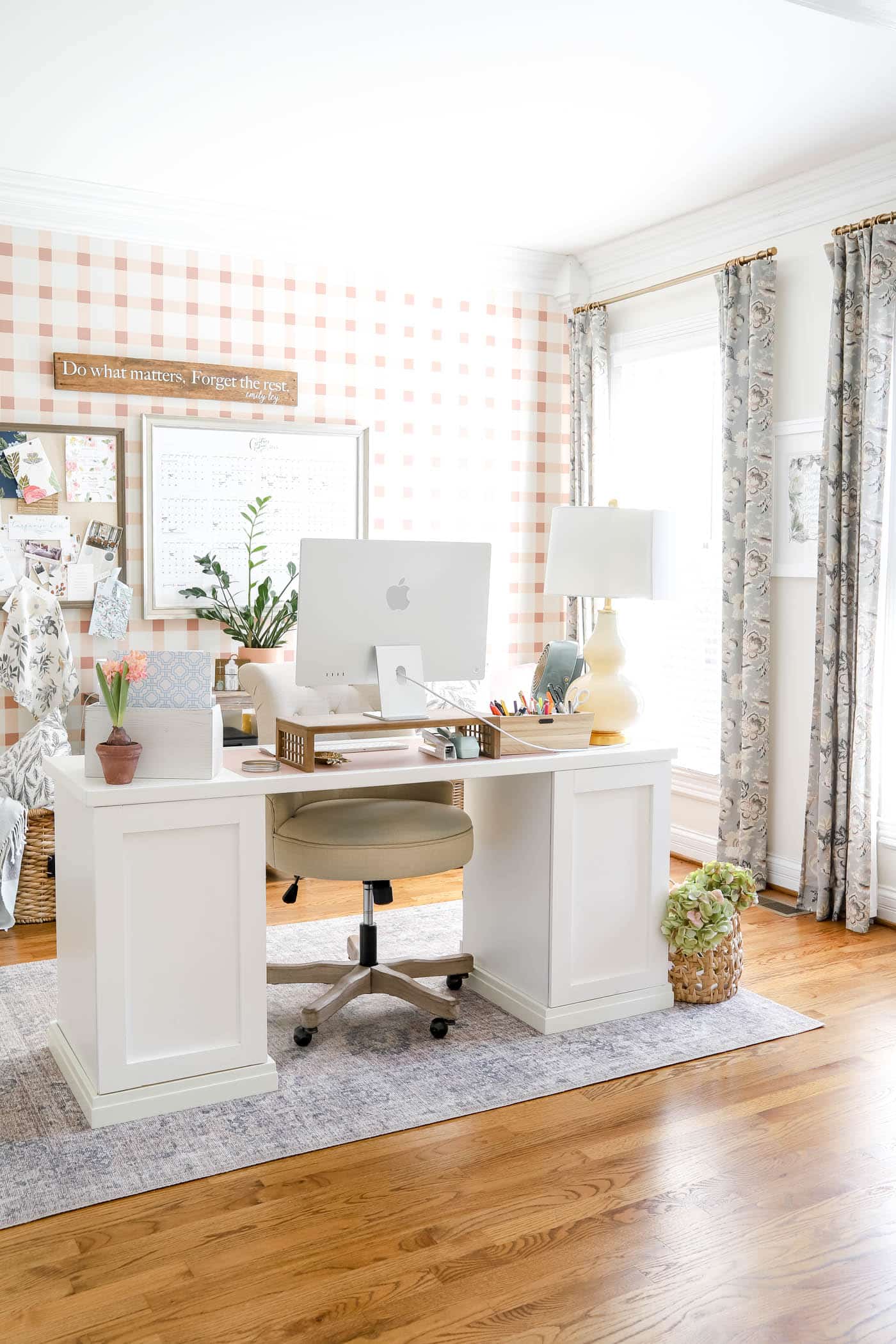 office with plaid pink and white wall