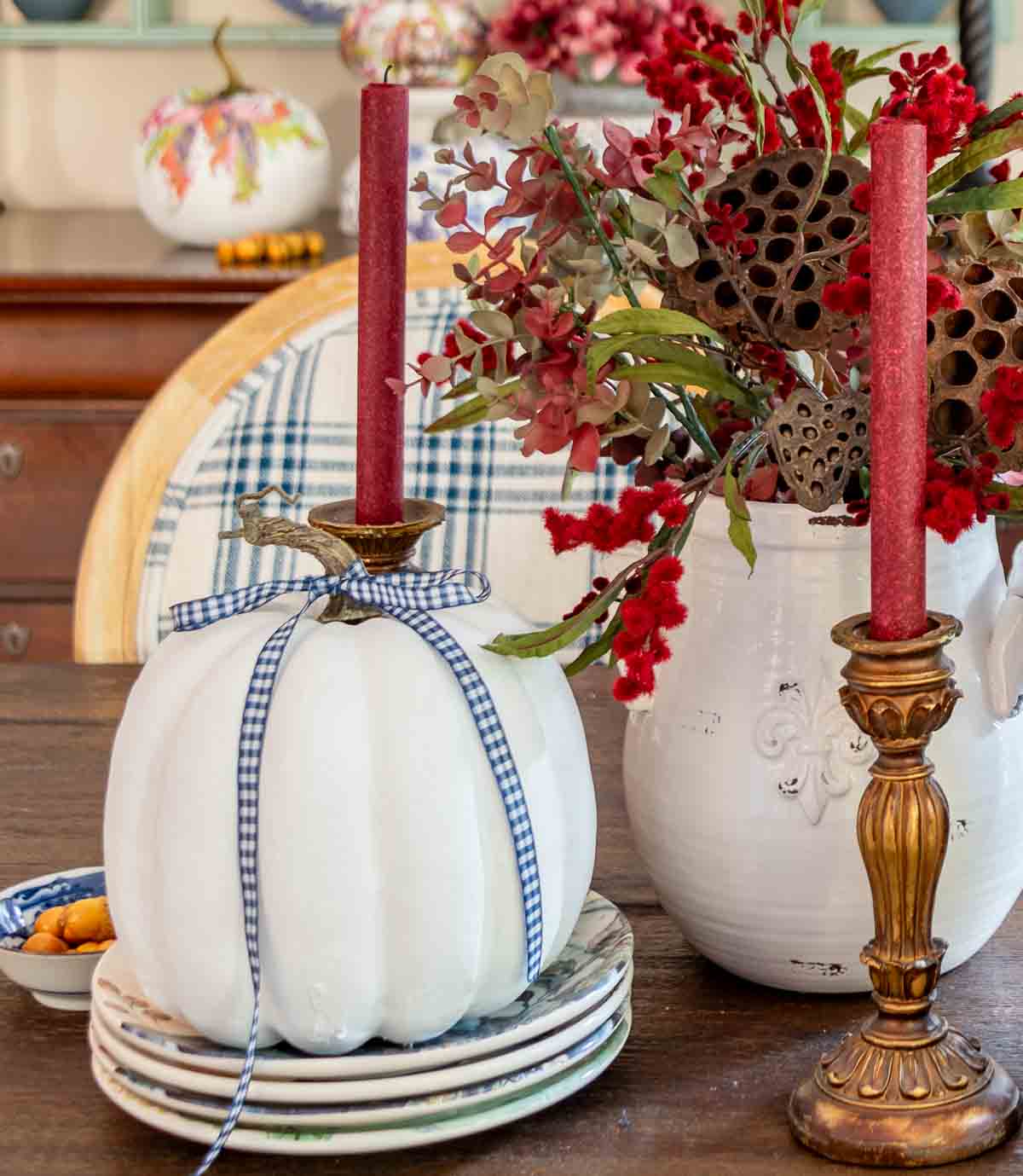 white pumpkin candle holders
